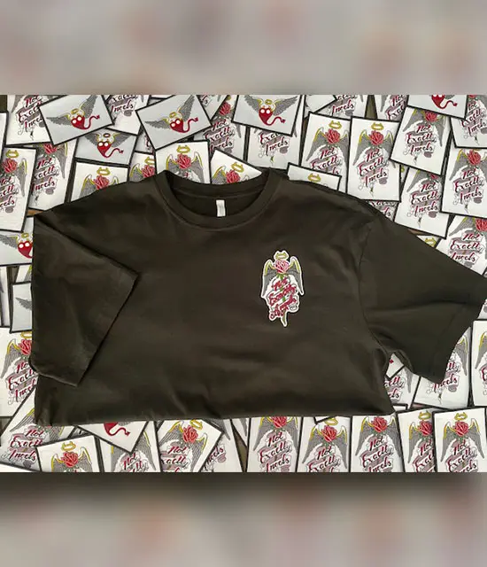 A black t-shirt with a picture of a dragon on it.